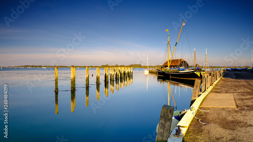 Sunrise over Bosham harbour and village, West Sussex, UK