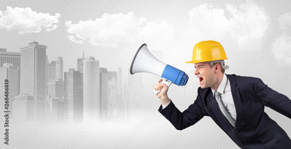 Young supervisor architect yelling to far big city panorama
Young supervisor architect yelling to far big city panorama