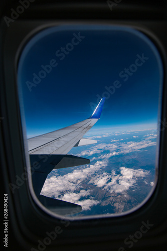 view from airplane window to sky