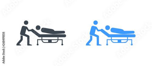 Man pushing the stretcher with a sick person icon - Glyph vector sign