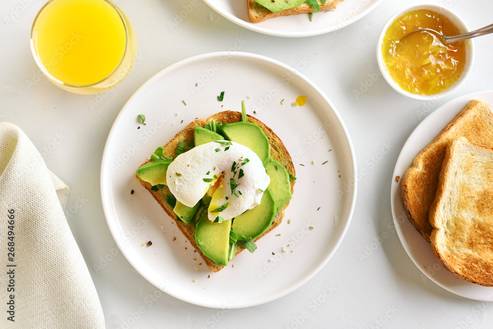Poached eggs on toasted bread with vegetables Poached eggs on toasted bread with vegetables