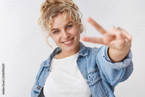 Konstfotografi Optimistic lucky energized good-looking female fitness trainee blond curly hairc