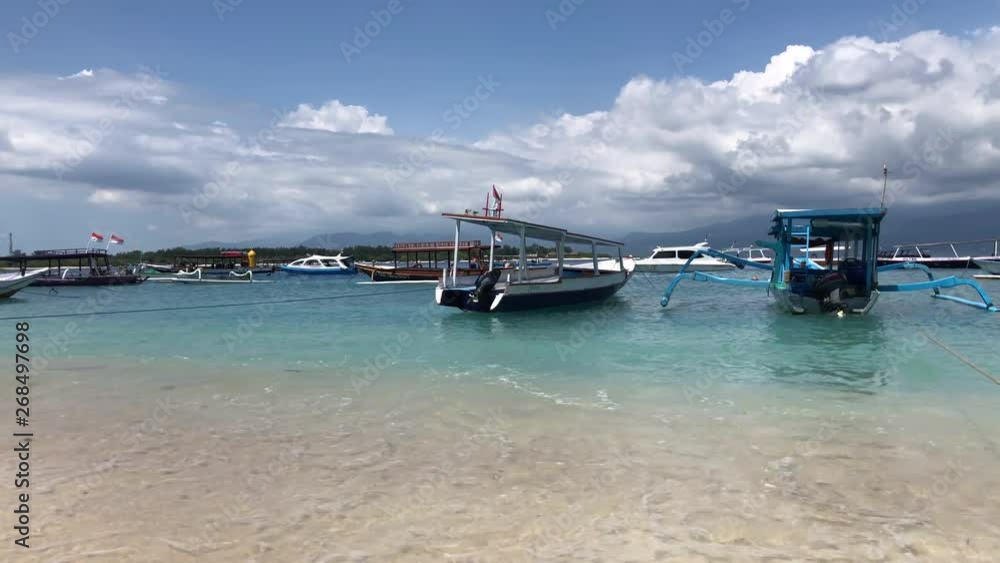 Ethnic bali boats at tropical paradise beach in Bali Ethnic bali boats at tropical paradise beach in Bali