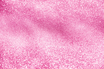 festive glittering christmas lights. Blurred abstract pink background
