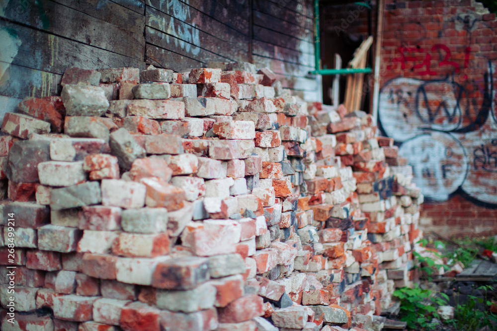 old bricks stacked along the wall