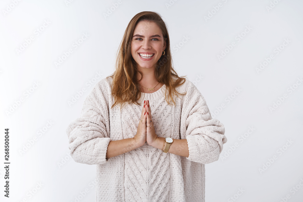 Woman practising yoga calm down release stress acting healthy wellbeing lifestyle press palms together namaste praying gesture smiling happy white teeth expressing positivity, studio background Woman practising yoga calm down release stress acting healthy wellbeing lifestyle press palms together namaste praying gesture smiling happy white teeth expressing positivity, studio background