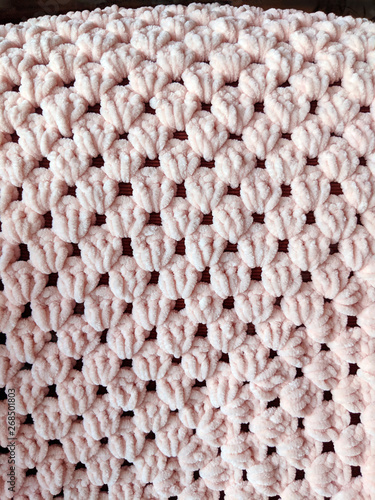 closeup of baby blanket with knitting pattern