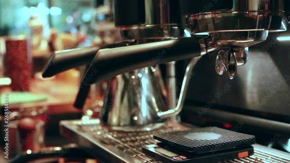 Coffee machine in action at the Coffee Shop Coffee machine in action at the Coffee Shop