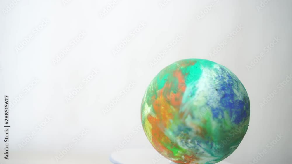 models clay earth globe in creating rotating, Spinning world global ecology on gray background. loop created in 4K models clay earth globe in creating rotating, Spinning world global ecology on gray background. loop created in 4K
