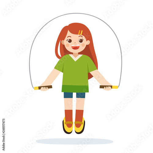 Young sportive girl doing exercises with jumping rope.