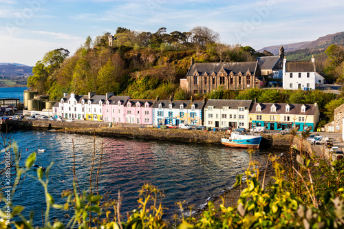 Popular senic tourist attraction, view of colorful houses at harbour of Portree, Isle Of Skye Scotland, United Kingdom photo