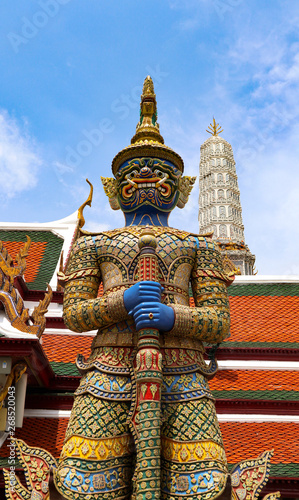 Wat Phra Kaew or Temple of Emerald Buddha  Guardian statues and Grand palace located within the grounds of the Grand Palace in Bangkok is Thailand   s most sacred temple and pilgrimage site for Thai