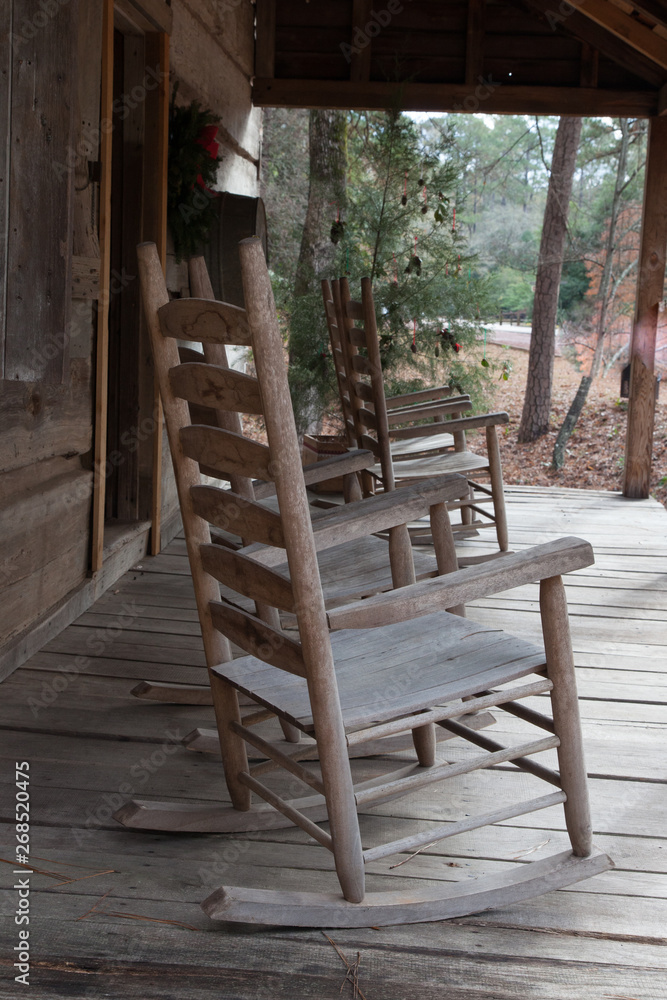 Rocking chairs on a front porch of a cabin