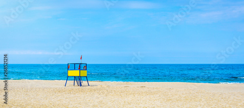 lifeguard tower at the beach.  background for summer postcard from vacation © solidmaks