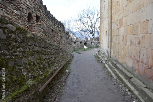 Fototapeta Naklejka Na Ścianę i Meble -  Ananuri Fortress Courtyard by Chapel, Georgia