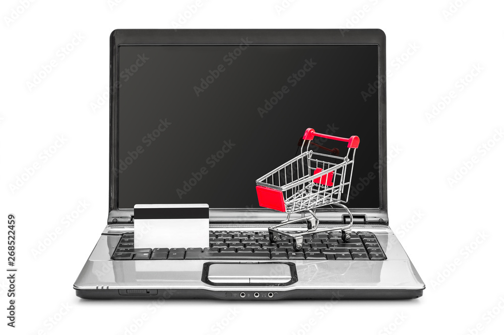 Laptop with small shopping cart and credit card on white background. Laptop with small shopping cart and credit card on white background.