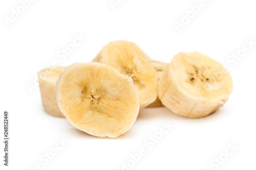 Pieces of banana on white background.