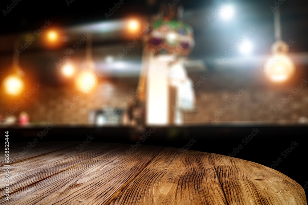Desk of free space and blurred bar background. Desk of free space and blurred bar background.