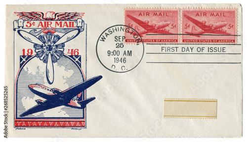 Washington D.C., The USA  - 25 September 1946: US historical envelope: cover with cachet Air mail, cargo and passenger aircraft, propeller, red postage stamps, five cents, first day of issue photo