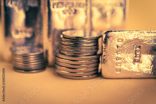 Gold bars and stack of gold coins. Background for finance banking concept. Trade in precious metals.