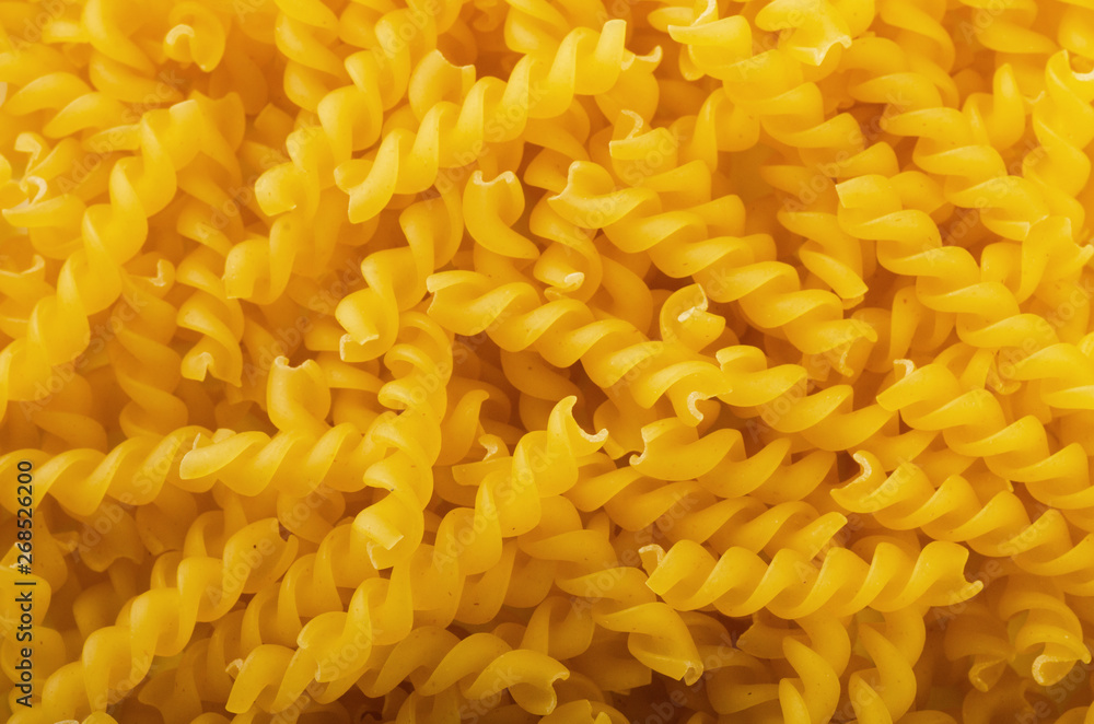 Fusilli spiral pasta background Fusilli spiral pasta background