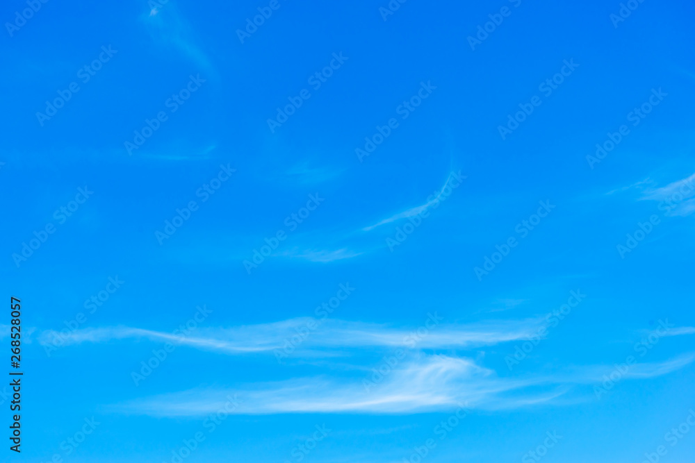 Light cirrus clouds against the blue sky. Light cirrus clouds against the blue sky.