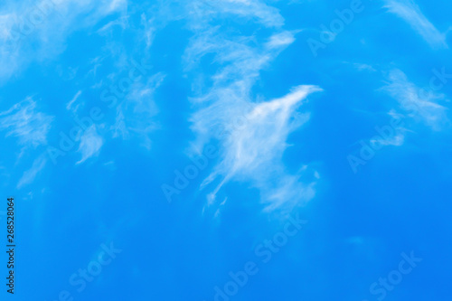 Cirrus clouds on a blue spring sky.