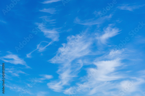 Cirrus clouds on a blue spring sky. Background.