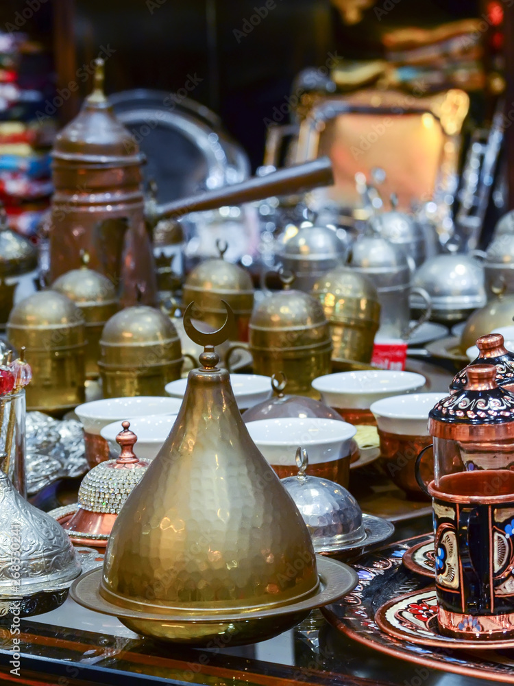 Turkish coffee sets and Jezve pot on the bazaar counter. Typical Turkish souvenirs. Turkish coffee sets and Jezve pot on the bazaar counter. Typical Turkish souvenirs.