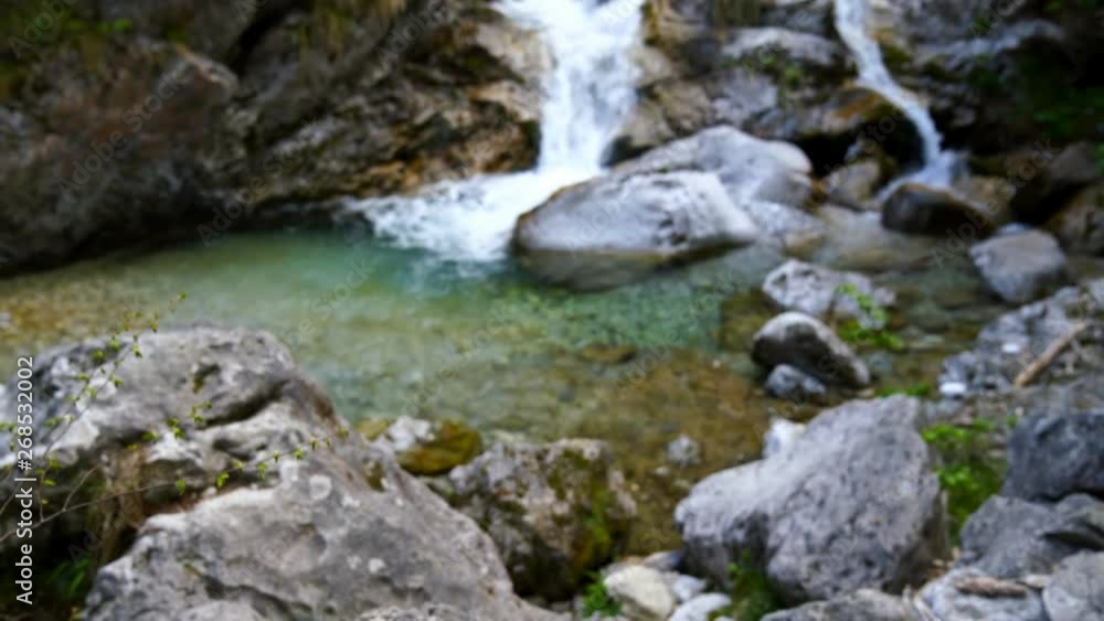 Tiny waterfall at the Val Vertova Torrent near Bergamo,Seriana Valley,Italy,tilt shot. Tiny waterfall at the Val Vertova Torrent near Bergamo,Seriana Valley,Italy,tilt shot.