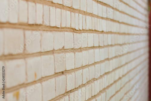 White brick wall in perspective photography.