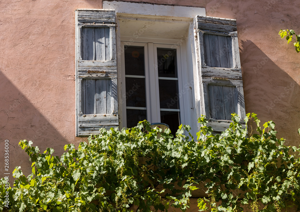 Old  house with  wooden shutters, Provence, France.