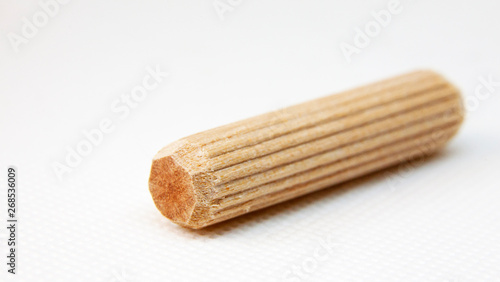 wooden dowel on white background