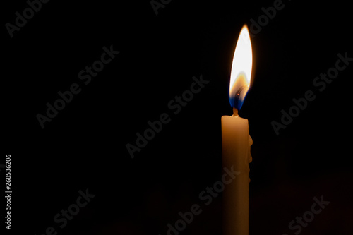 Candle light in the dark. Abstract of creative light and hope on dark background 