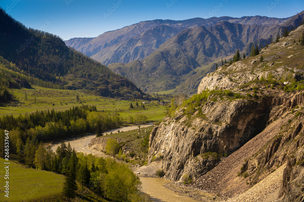 Naklejka premium High mountains and blue sky