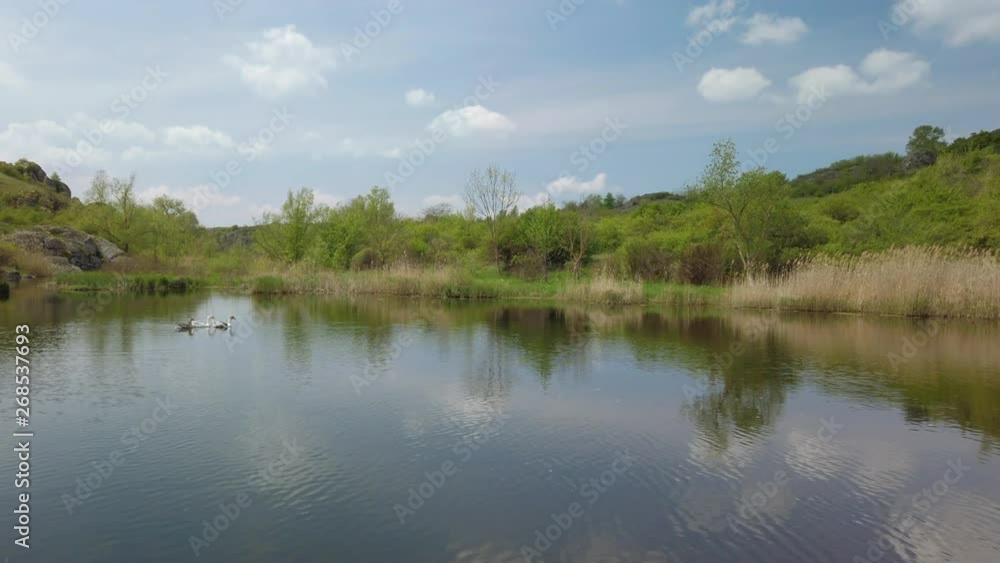 Calm river in Aktov Canyon in Granite-steppe lands of Buh park Calm river in Aktov Canyon in Granite-steppe lands of Buh park