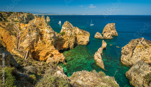 Fototapeta Naklejka Na Ścianę i Meble -  Scenic golden cliffs and emerald water in Ponta da Piedade, Lagos, Algarve, Portugal