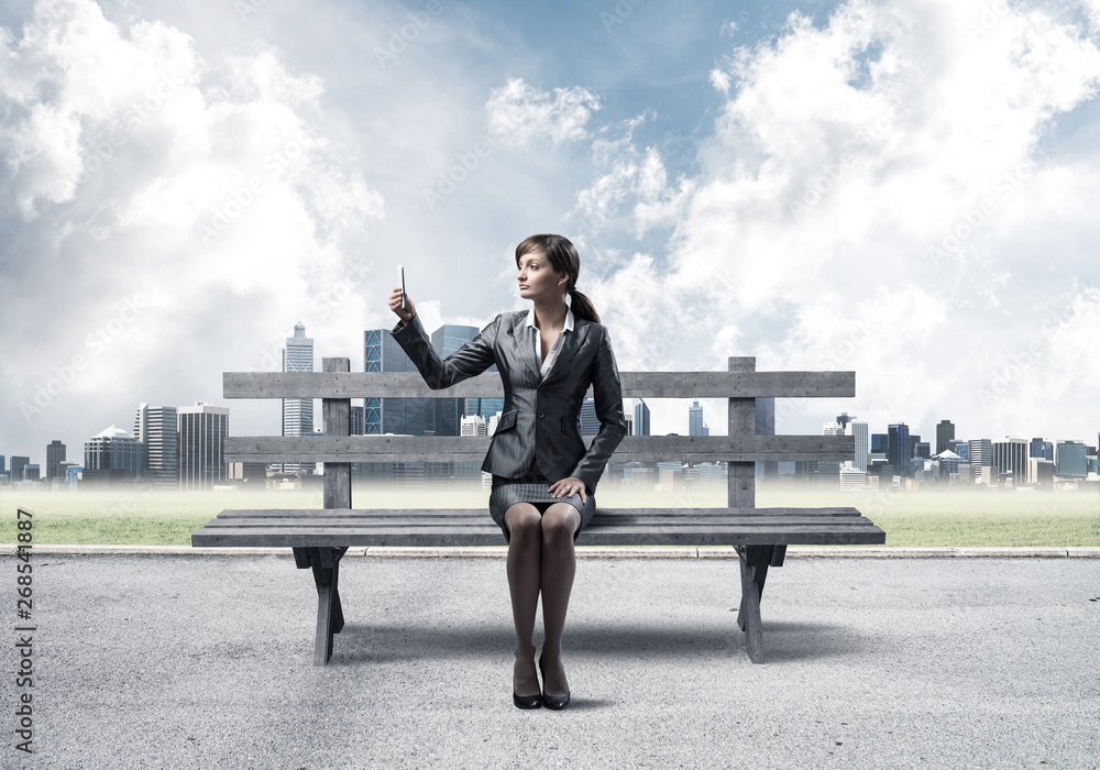 Business woman taking selfie photo or chatting Business woman taking selfie photo or chatting
