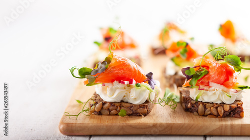 Canvas Print Mini canapes with smoked salmon