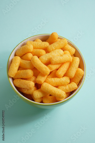 Fototapeta Naklejka Na Ścianę i Meble -  Cheese flavored puffed corn snacks