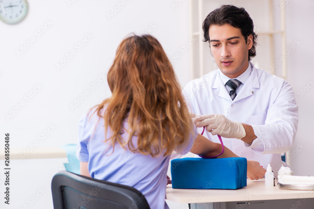 Female patient during blood test sampling procedure Female patient during blood test sampling procedure