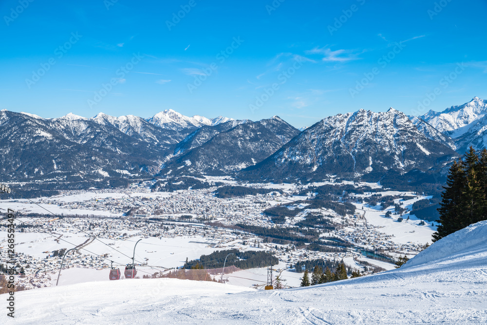 Panorama view of Austrian Alps in winter above the small town Reutte in Austria