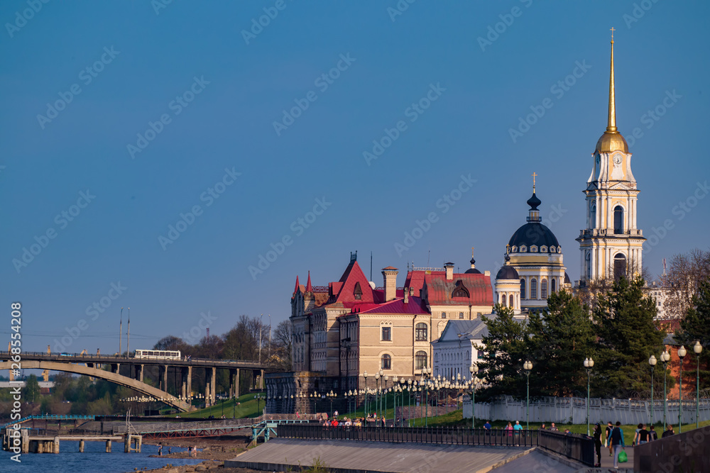 Rybinsk Transfiguration Cathedral and the building of the grain exchange on the Volga. Russia