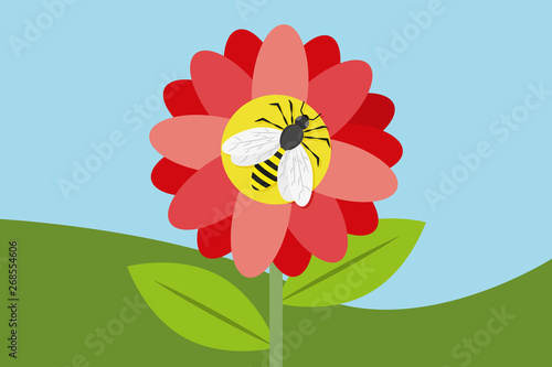 Abeja posada sobre una flor de pétalos rojos.