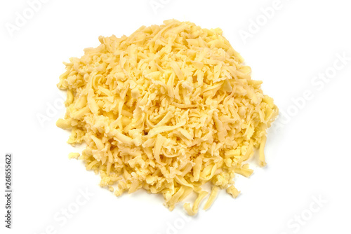 Grated cheddar cheese, close-up, isolated on white background