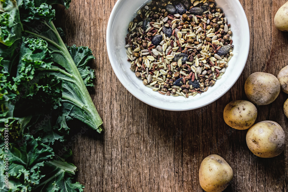 vegetable salad ingredients on wooden background vegetable salad ingredients on wooden background