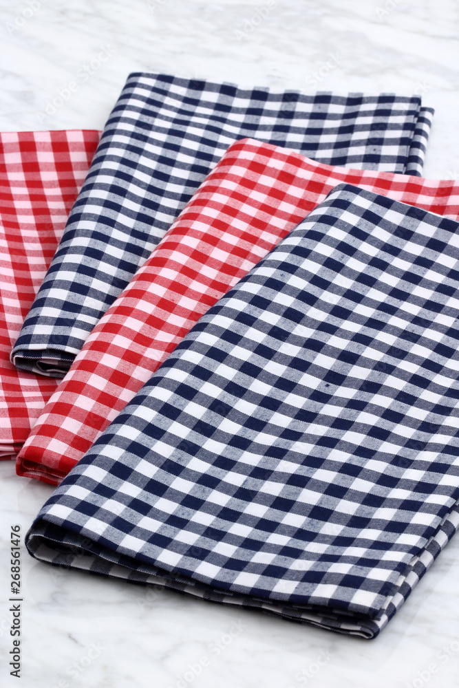 set of fabric napkins on marble countertop set of fabric napkins on marble countertop