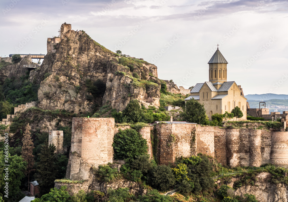 Horizontal photo of the Narikala fortress and the surrounding architecture of the Old Town in Tbilisi, Georgia, Caucasus, taken on early morning.