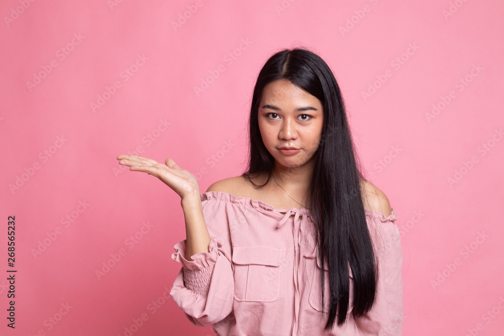 Beautiful young Asian woman show palm hand. Beautiful young Asian woman show palm hand.
