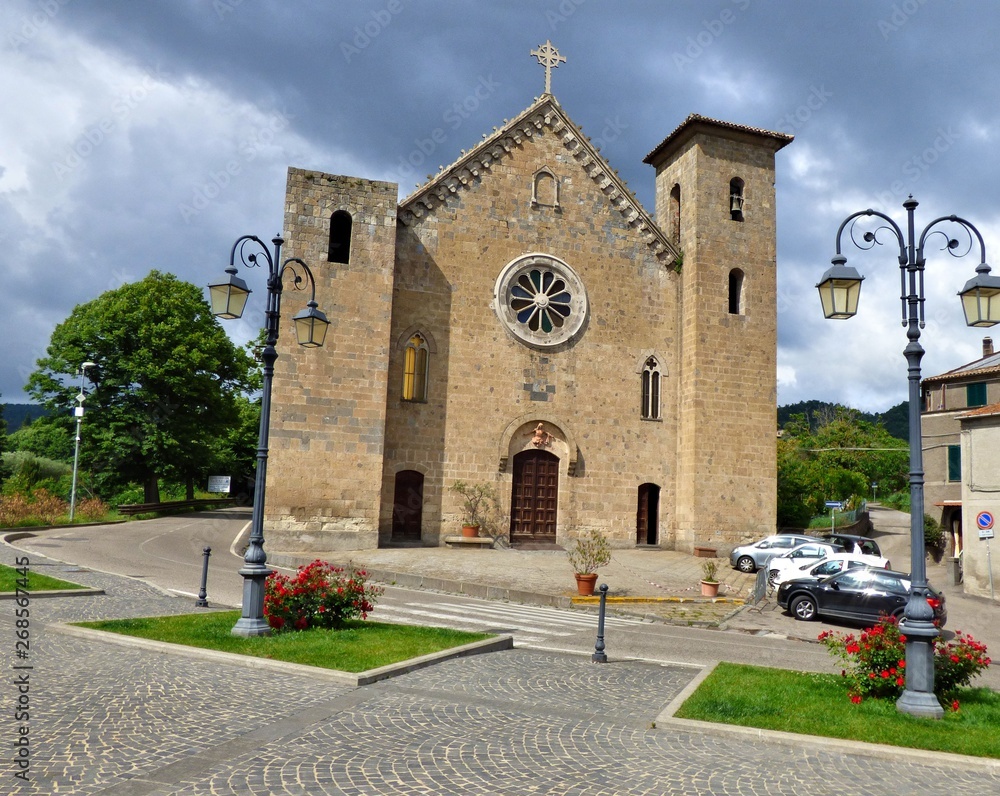 The Medieval StoneChurch at Bolsena Italy with a Stormy Sky Background The Medieval StoneChurch at Bolsena Italy with a Stormy Sky Background